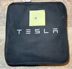 Tesla Mobile Connector Charger Like New With Case & Adapters Free Shipping. Fixed Price $225.00.